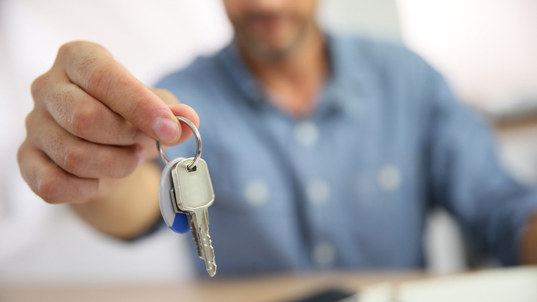 Man Holding Keys